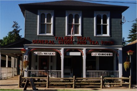 The Talbot Trail General Store and Tea Room, a two-storey clapboard building with white trim and red lettering.